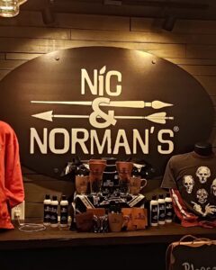 Nic & Norman's logo and swag